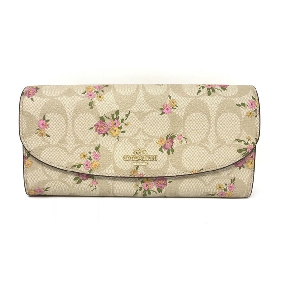 Coach Handbags - Coach Slim Envelope Wallet In Signature Canvas